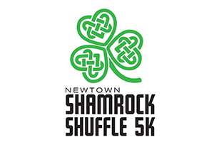Newtown Shamrock Shuffle 5k logo with green shamrock